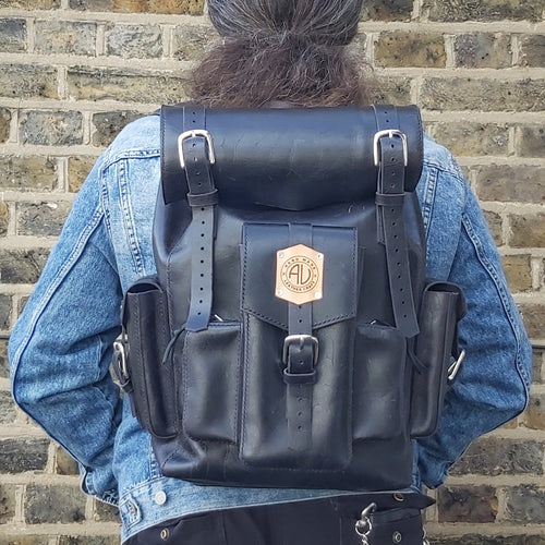 Crazy Cow Leather Hand Stitched Roll-Top Backpack show on model