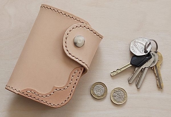 Biker Mini Wallet shown with set of keys and some coins